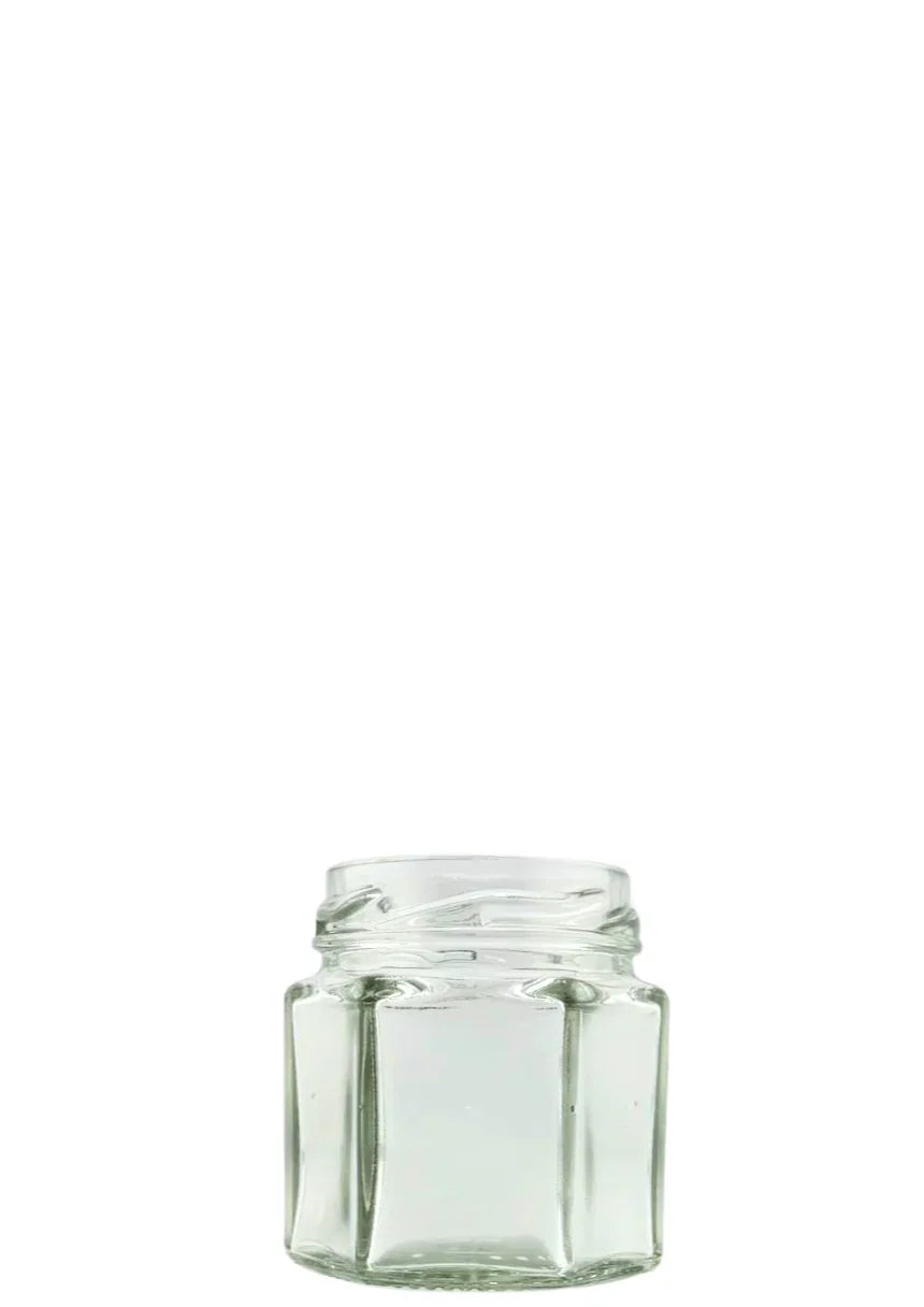 Petit bocal hexagonal en verre transparent pour conservation ou confiture, fond blanc