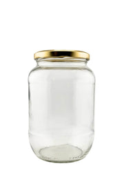 Clear glass jar with gold twist-off lid, empty, for food storage or preserves