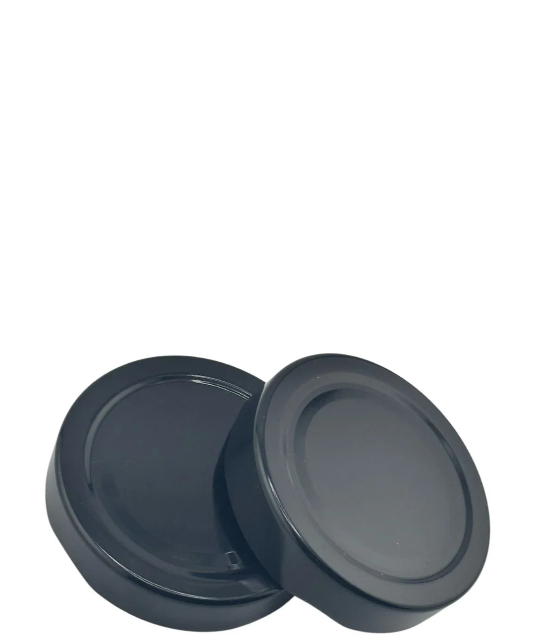 Couvercles noirs Twist-Off 70 mm pour bocaux en verre, posés sur fond blanc