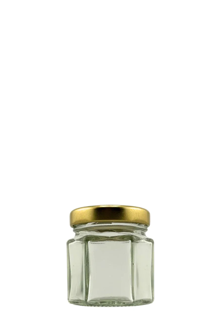 Bocal hexagonal en verre transparent avec couvercle doré pour conservation